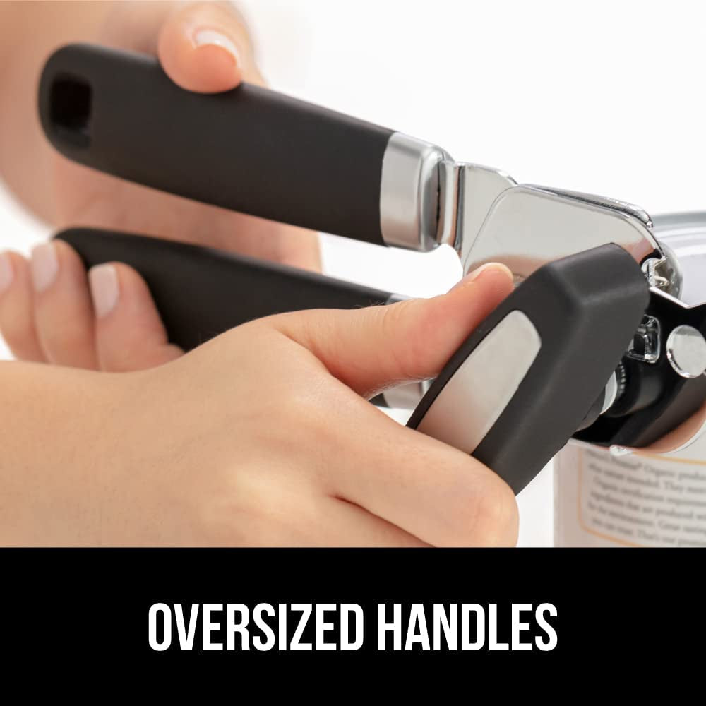 The Original  Heavy Duty Stainless Steel Smooth Edge Manual Can Opener and Bottle Openers, Soft Handle, Rust Proof Oversized Handheld Easy Turn Knob, Multifunctional Kitchen Tool, Black